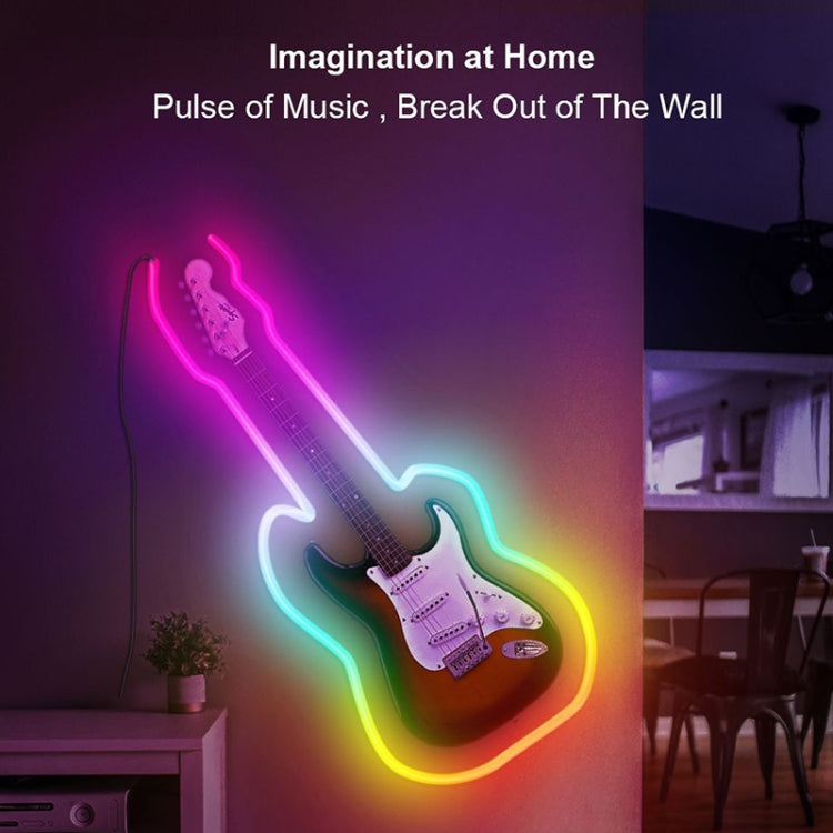 RGB neon rope light guitar outline with vivid multicolor glow
