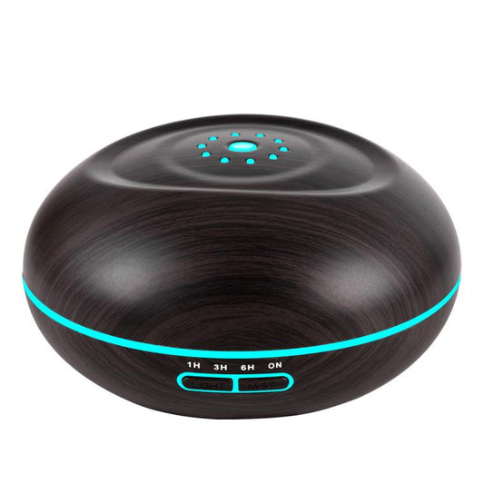 Dark woodgrain diffuser with blue LED ring, top light dots, and control panel