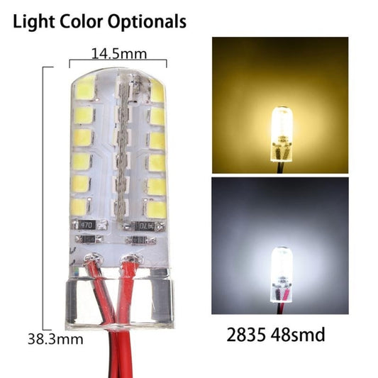 Transparent LED bulb with side LEDs, showing warm and cool white light output