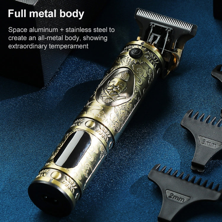 Bronze metal hair clipper with interchangeable guard attachments