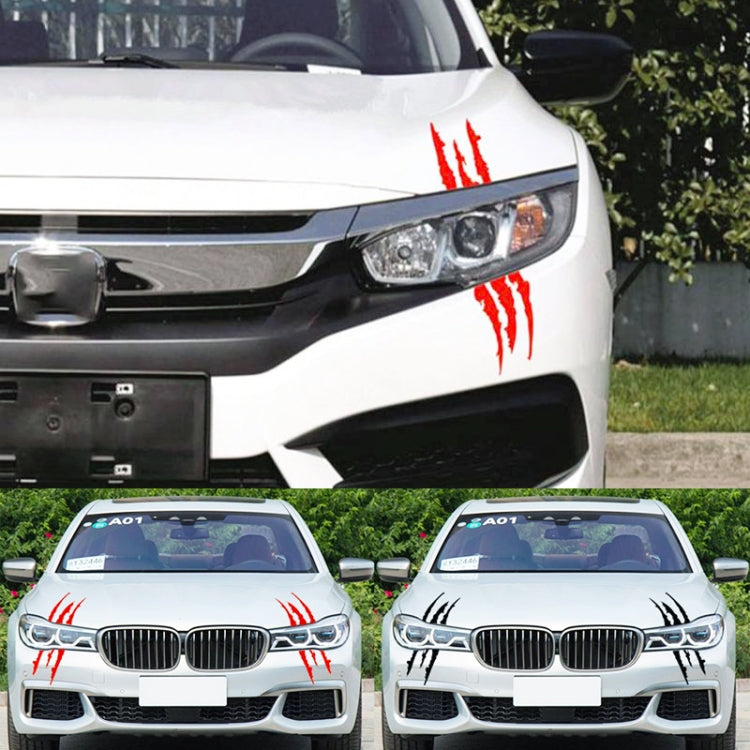 Reflective car decal sticker with red scratch stripe claw marks on front of white car