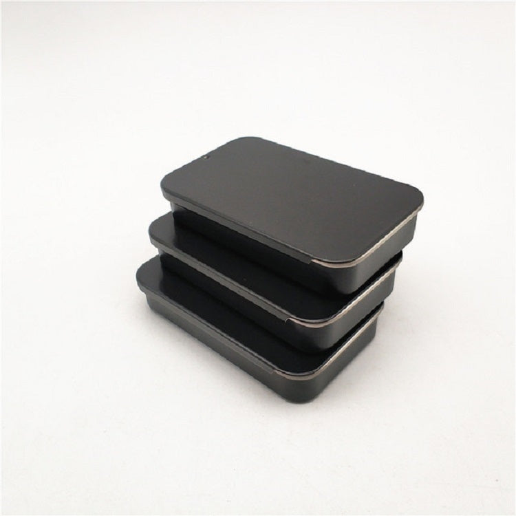 Set of two black guitar pick storage cases stacked