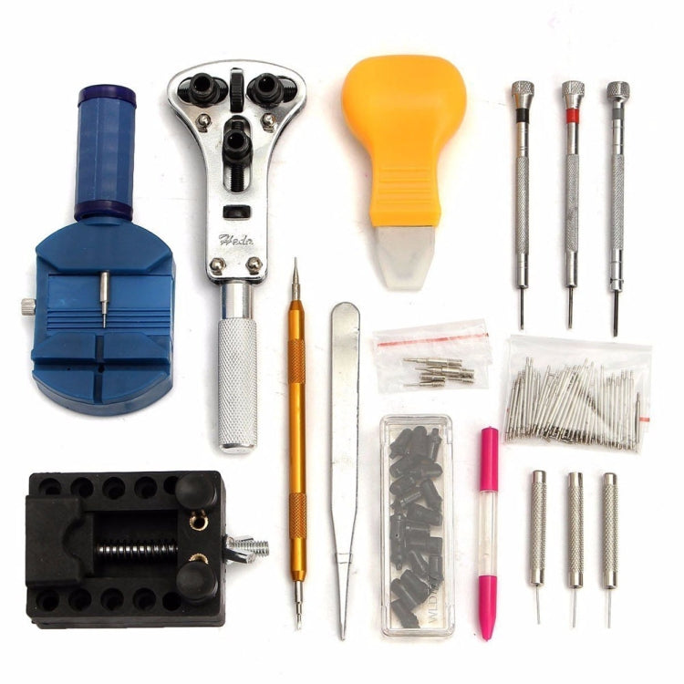 Watch repair tool set components: blue case opener, metal tools, tweezers, and needles