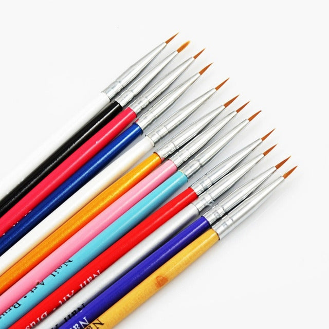 Assorted nail art liner brushes with fine metal points and colored grips