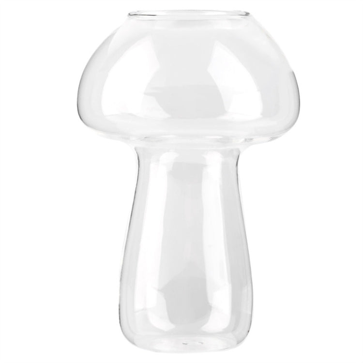 Clear mushroom-shaped glass vase with rounded bulb top and narrow stem