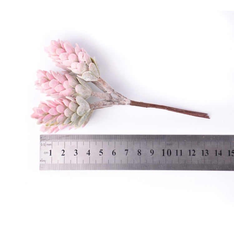 Artificial flower stem with pink pine-cone blooms and brown twig-like branch