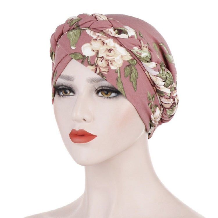 Women’s floral printed dusty rose turban hat with layered roses, short pullover style.
