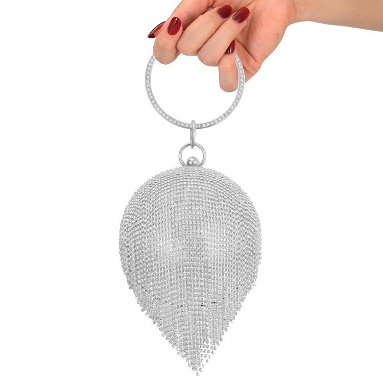 Silver crystal tassel clutch bag with beaded teardrop design and metal ring handle