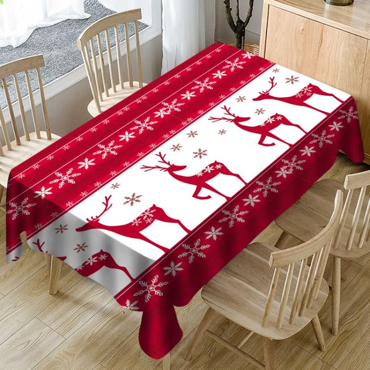 Christmas tablecloth with red and white reindeer and snowflake design