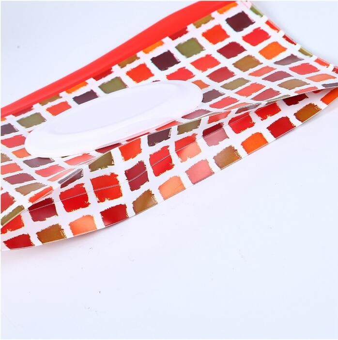 EVA wipes bag with flip lid, red check pattern, strap loop extended