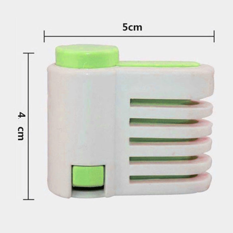 Green multi-layer cake slicer tool, 5 cm by 4 cm size