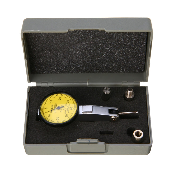Dial indicator in gray hard case with yellow dial and metal mounting parts