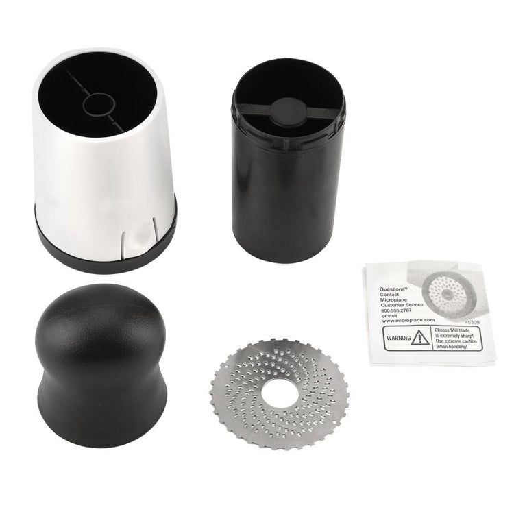 Cheese grater mill set: two casings, spare grating disc, and safety card