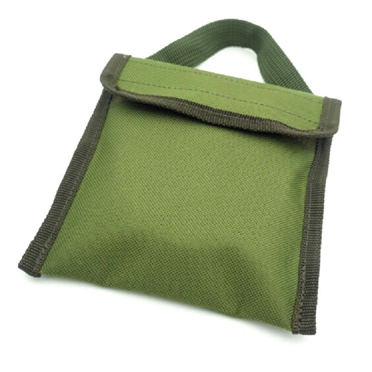 Green storage pouch with carry handle for folding pocket wood stove