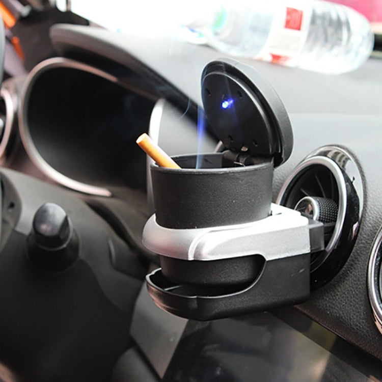Installed car LED ashtray with open lid, black cup and blue LED glow