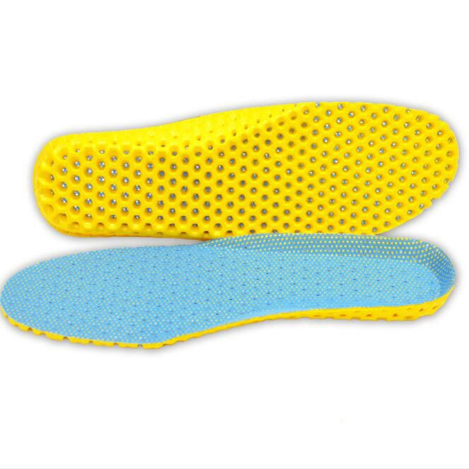 Pair of running insoles: yellow honeycomb top with light blue textured base