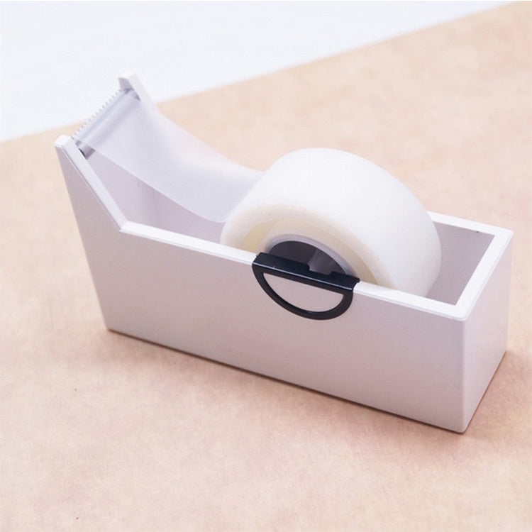 White desktop tape dispenser with tape roller and serrated cutting edge