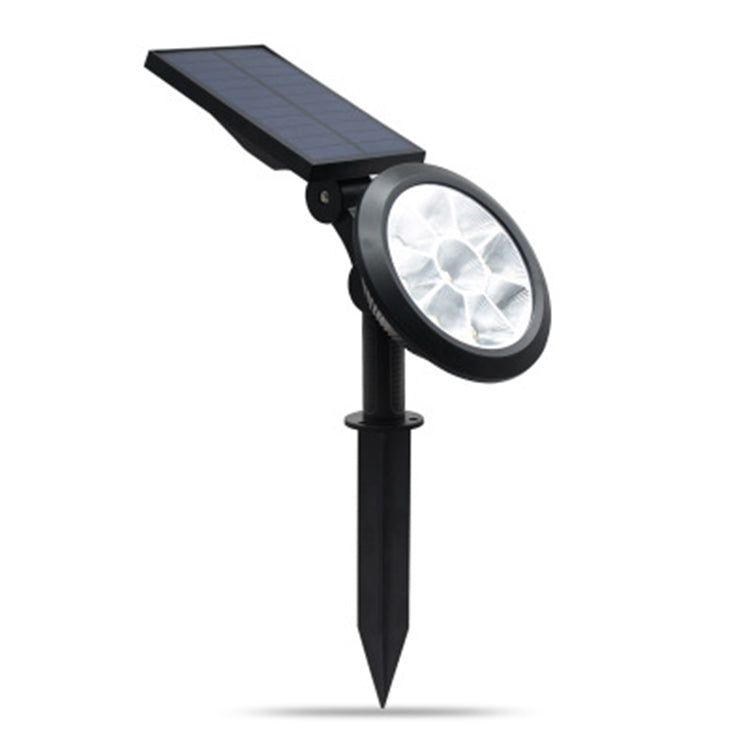 Solar powered LED garden spotlight with solar panel and pointed ground stake, black