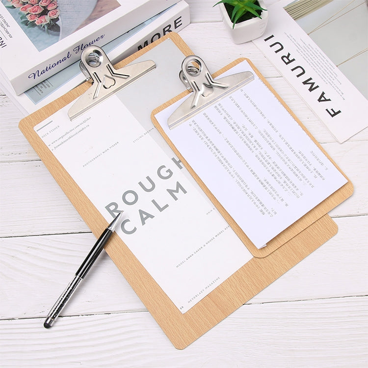 Two wooden clipboards stacked, each with metal butterfly clip and papers