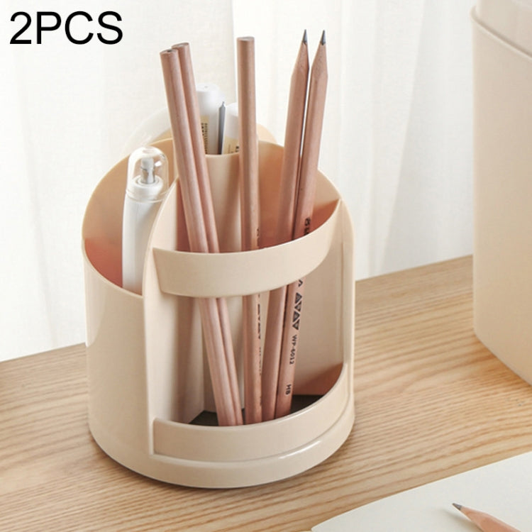 Pink paw-shaped rotating pen holder tray with multiple pen slots, plastic storage box.