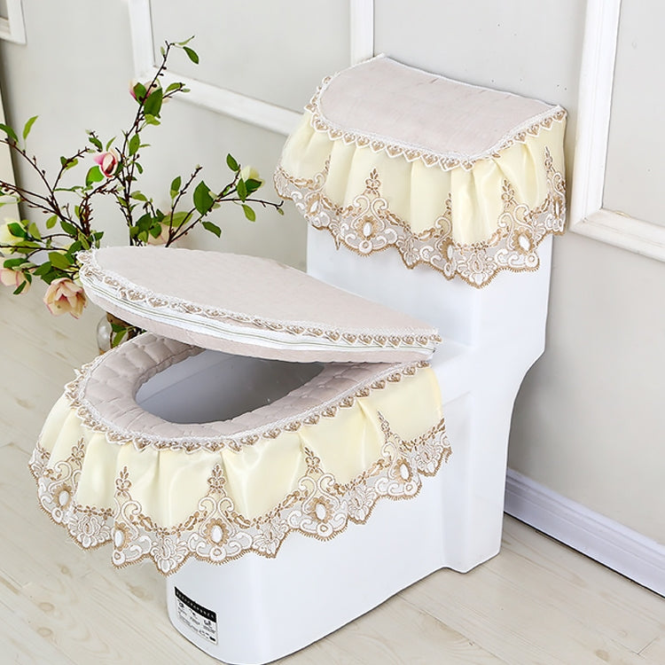 Beige fabric toilet seat cover set with lace trim, zipper closure, open seat hole