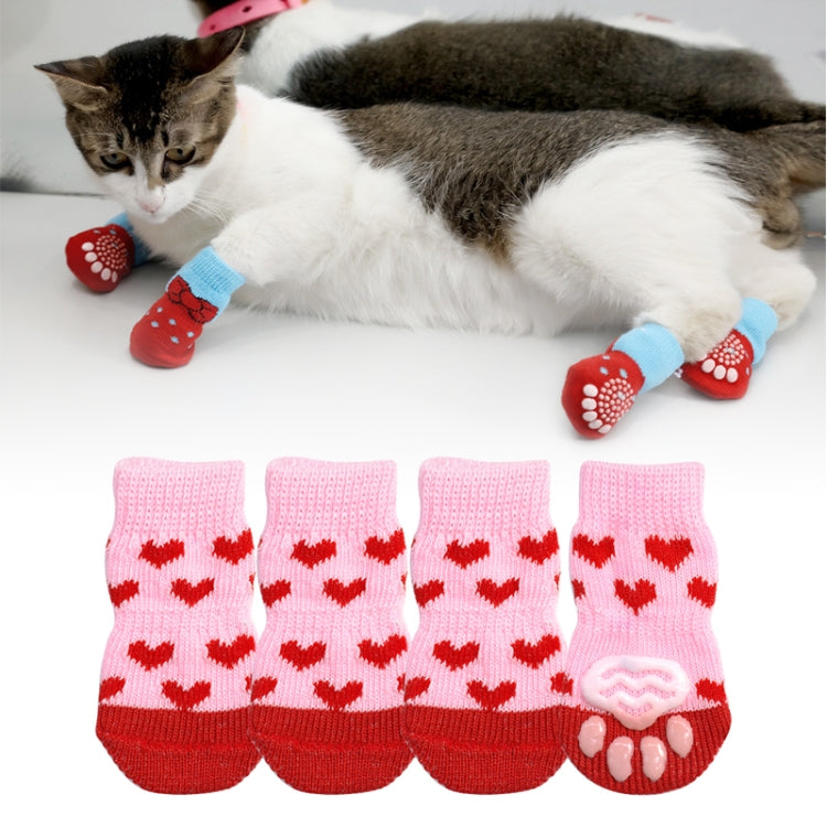 Set of 4 non-slip pet socks, pink uppers with red heart print and small paw trim