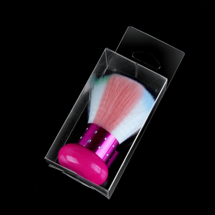 Soft-fur nail dust brush in clear box packaging with pink handle and gradient bristles
