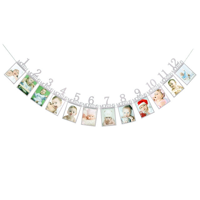 Light gray 1–12 month photo banner garland with numbered arches and baby photo cards