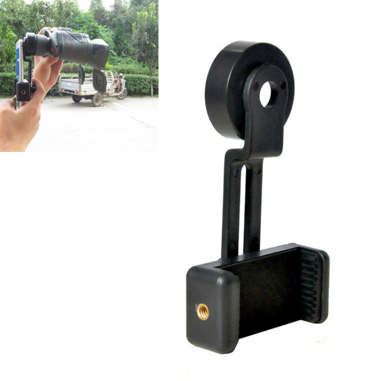Black telescope phone holder clip mounted on telescope with phone in hand.