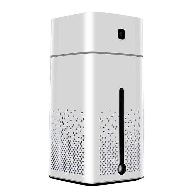 White ultrasonic air humidifier with perforated front vents and vertical mist level indicator