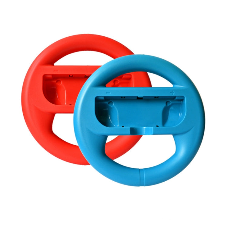 Red and blue steering wheels with controller cradle attached
