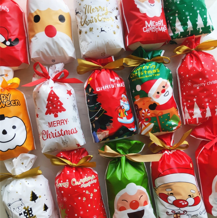 Assorted Christmas drawstring cookie gift bags with festive characters and ribbon bows