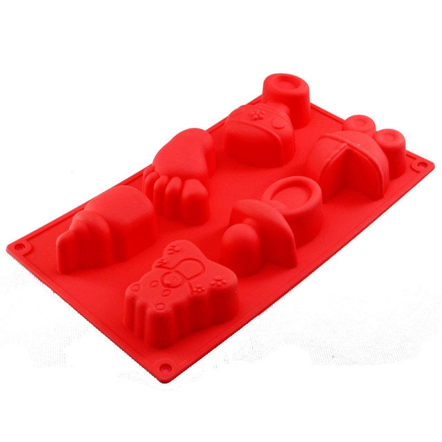 Red silicone baby shape mold with multiple animal and baby toy figure cavities