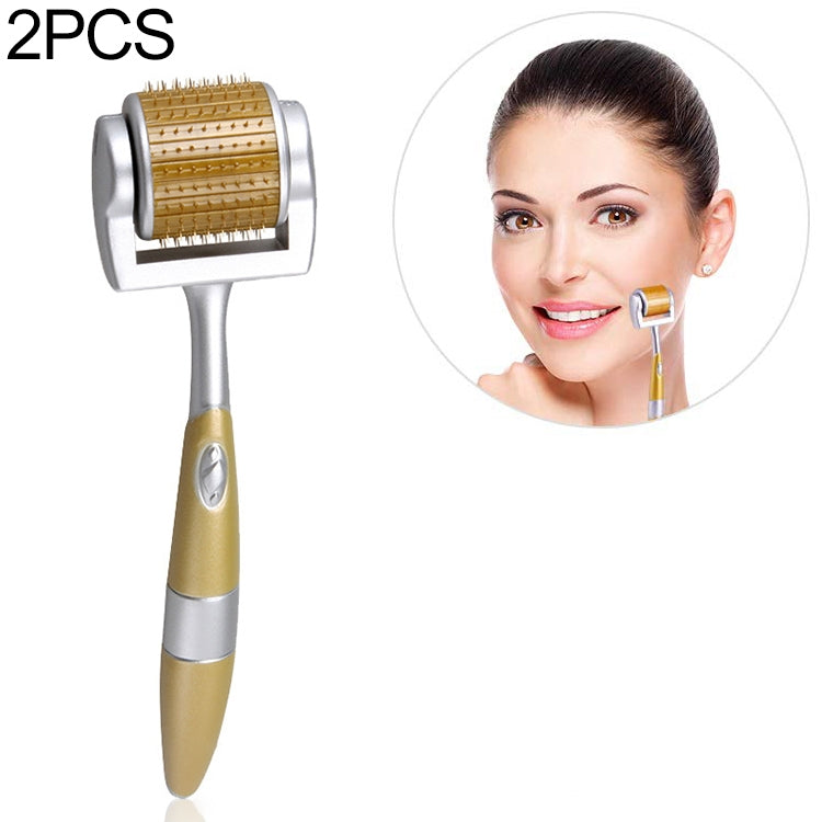 Handheld microneedle facial roller with gold handle and metal needle roller drum