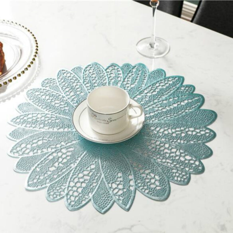 Sunflower-shaped PVC placemat with teal lace petals and round center for a tea cup