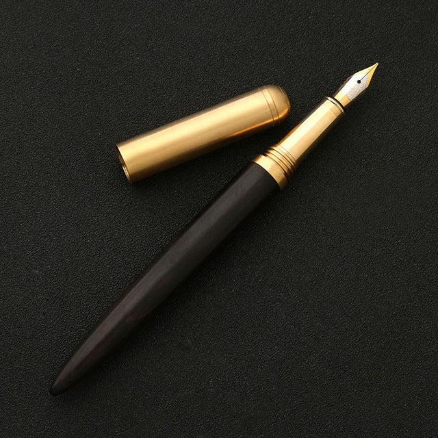 Wood fountain pen with gold nib and cap, dark wood barrel with matching cylindrical cap