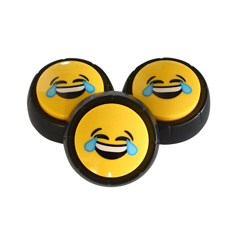 Three yellow electronic squeeze sound buttons with crying face emojis on black bases