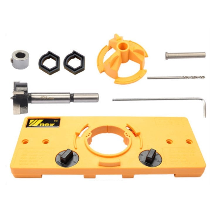 Yellow cabinet hinge hole locator kit with guide plate, hex parts, and metal rods