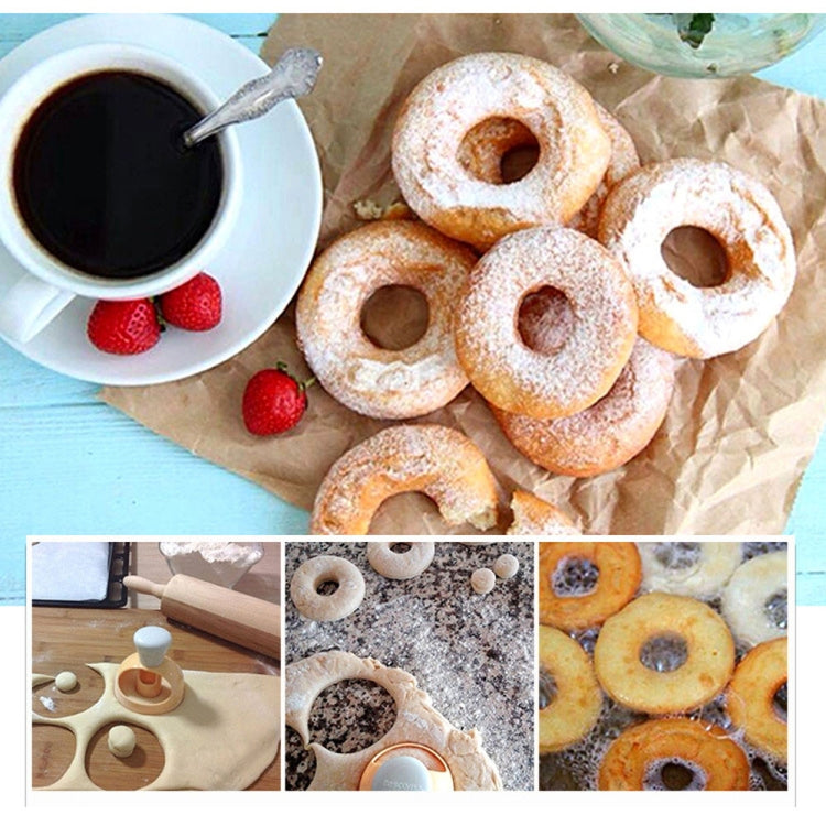 Donut mold tool with pale handle, shown with powdered mini donut pastries