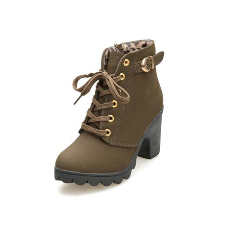 Women’s snow boots with olive-brown leather-look upper, lace-up ties, faux fur collar