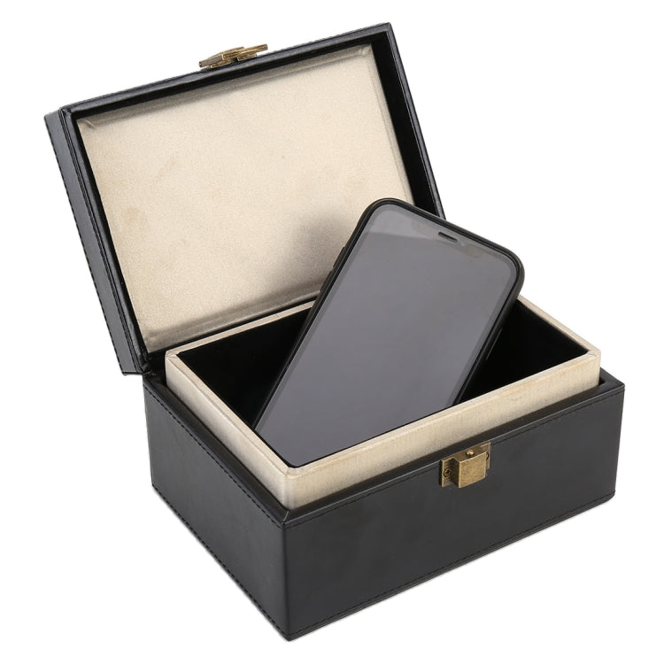 Black PU flip shielding safe box, open with dark smartphone on beige insert