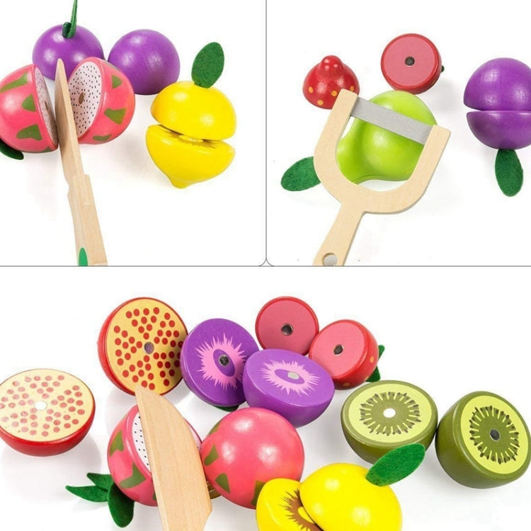 Close-up wooden magnetic fruit pieces with slice tops and leaf accents