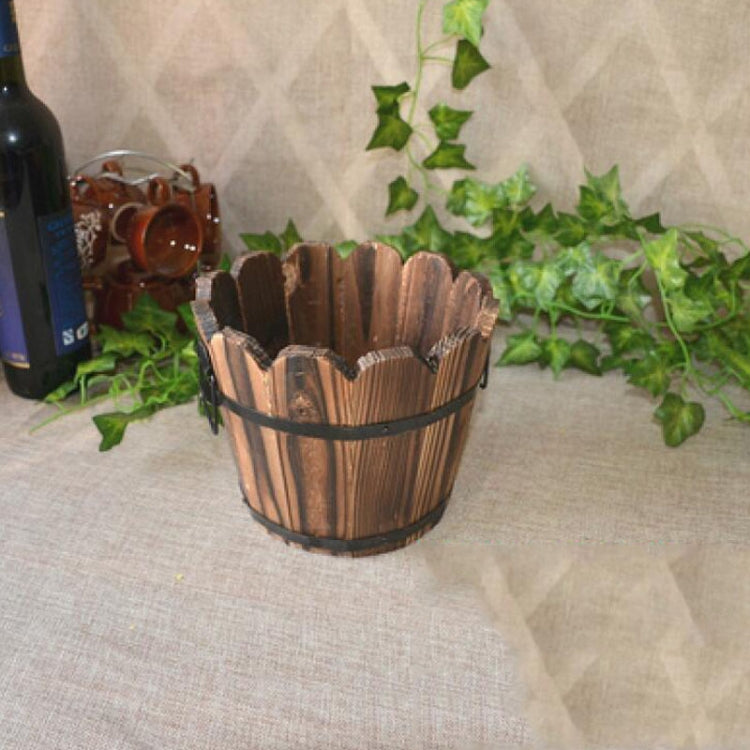 Carbonized wood flower pot: small wooden bucket angled view with dark strap bands
