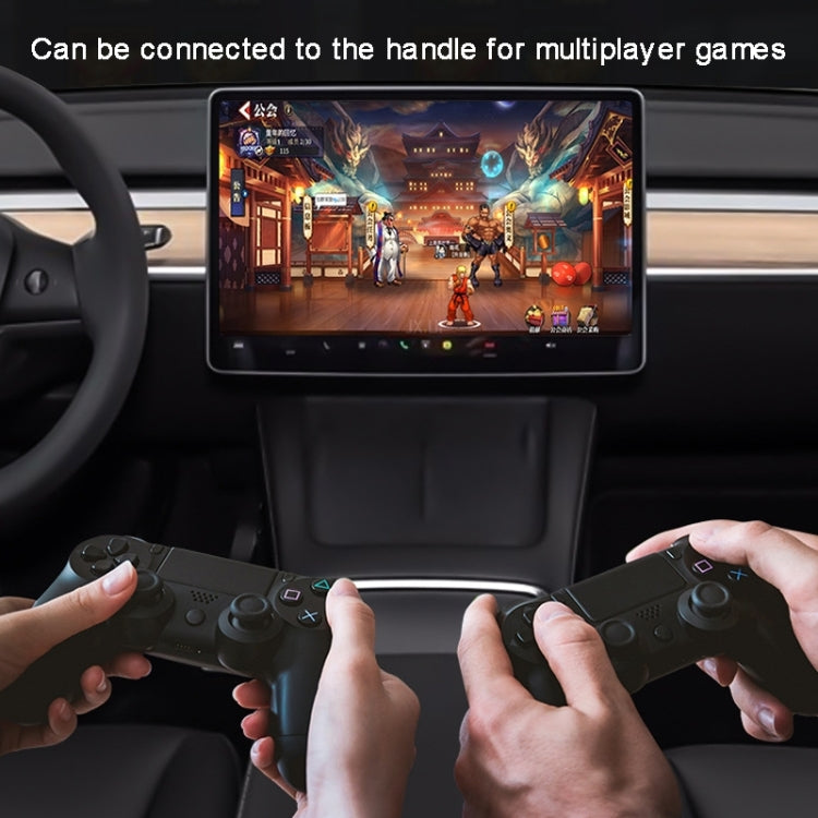 Car rear-seat gaming setup with controllers and tablet connected near the charging hub
