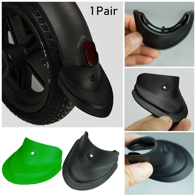 Fishtail rubber fender pair showing black and green versions with mounting holes