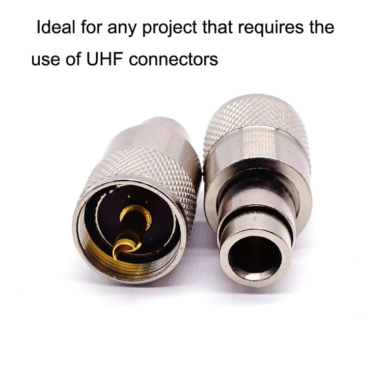 UHF male PL259 connectors showing inner contact and gold pin, silver metal housings