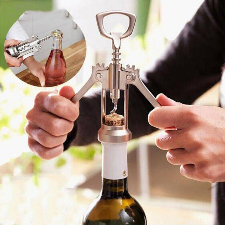 Zinc alloy bottle opener in use with hands pulling the cork from a wine bottle