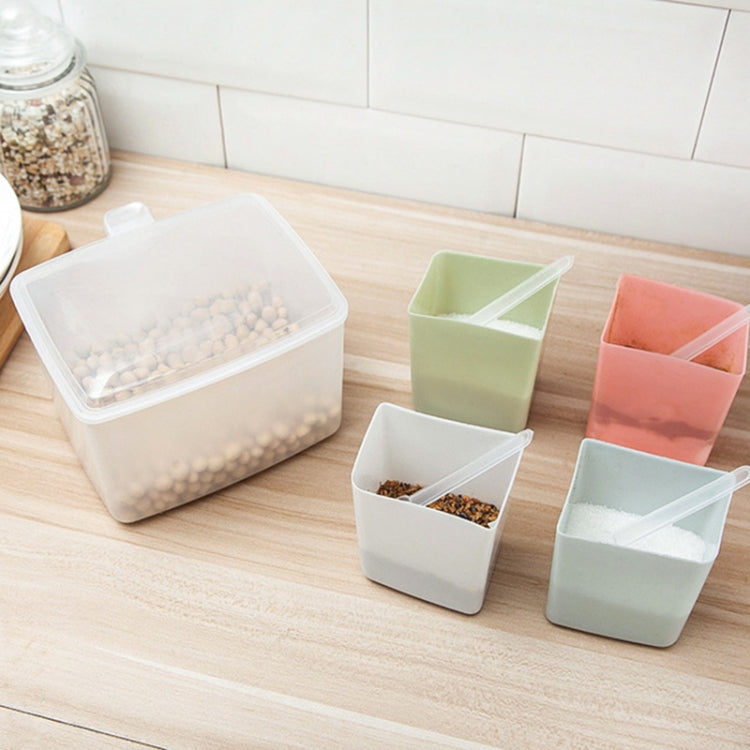 Stacked spice storage boxes with pastel compartments and clear front sections