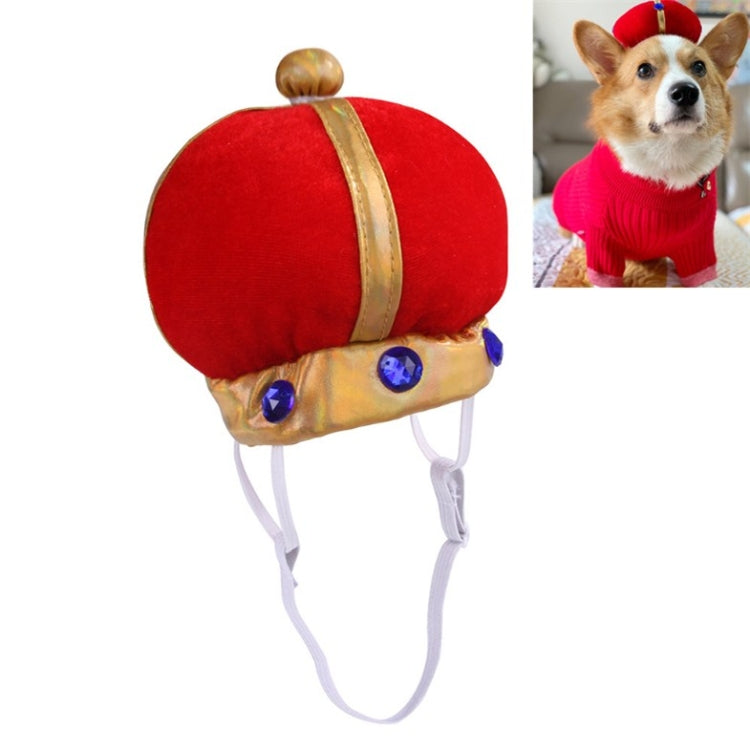 Red plush pet crown hat with gold stripe, blue jewel ornaments, and white elastic chin straps.