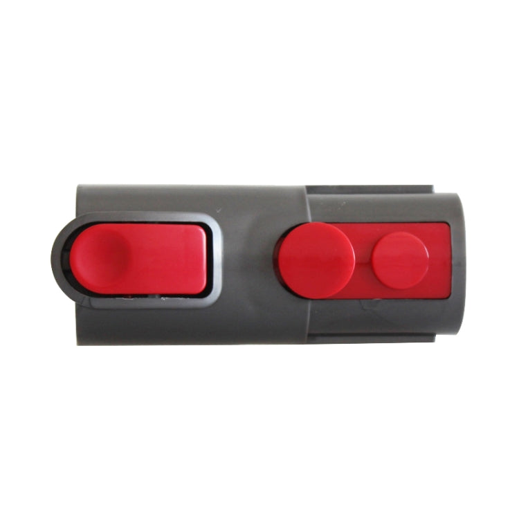 Vacuum cleaner adapter tool joint with red tabs on gray body